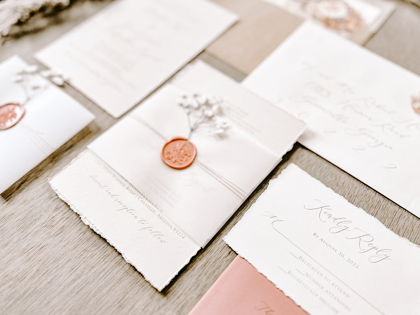 Dusty Rose Pink Wedding Invitation with Baby’s Breath, Deckled Edging, Vellum Belly Band and Wax Seal