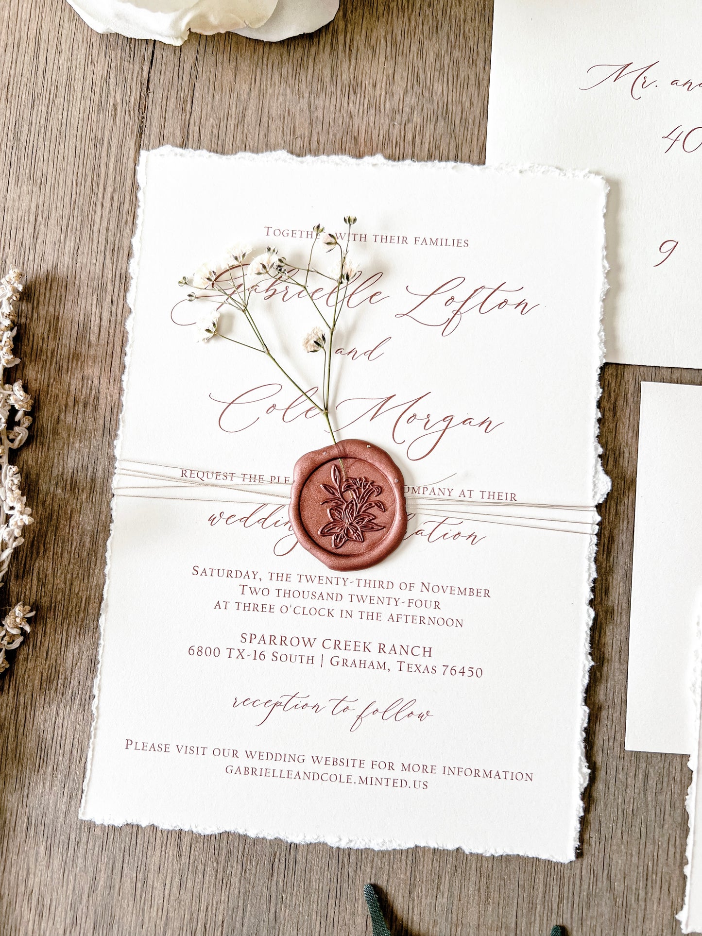 Ivory Baby’s Breath Wedding Invitation with Deckled Edging, Khaki Thread and Copper Wax Seal