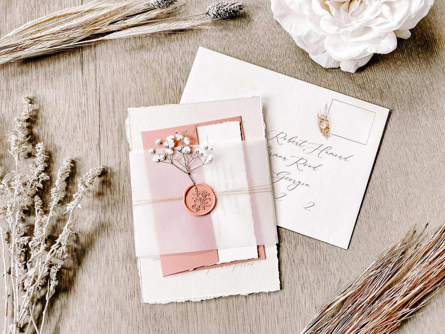 Dusty Rose Pink Wedding Invitation with Baby’s Breath, Deckled Edging, Vellum Belly Band and Wax Seal
