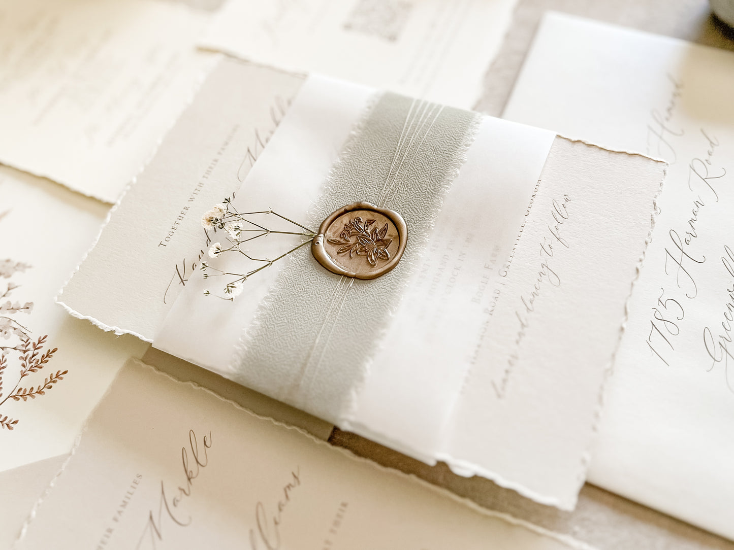 Muted Sage Green Wedding Invitation with Deckled Edging, Vellum, Ribbon, Baby’s Breath and Wax Seal
