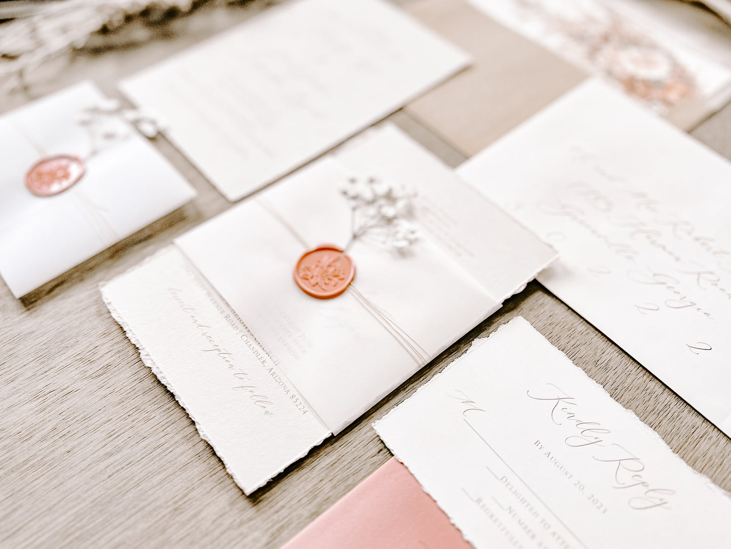 Dusty Rose Pink Wedding Invitation with Baby’s Breath, Deckled Edging, Vellum Belly Band and Wax Seal