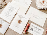Contemporary Ivory Wedding Invitation with Baby’s Breath, Deckled Edging, Vellum Belly Band and Wax Seal