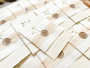 Neutral Wedding Invitation with Deckled Edging, Vellum Belly Band, Chiffon Ribbon, Dried Baby’s Breath and Wax Seal