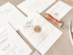 Contemporary Ivory Wedding Invitation with Baby’s Breath, Deckled Edging, Vellum Belly Band and Wax Seal