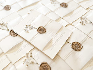 Elegant Ivory Baby’s Breath Wedding Invitation with Deckled Edging, Vellum Belly Band and Wax Seal