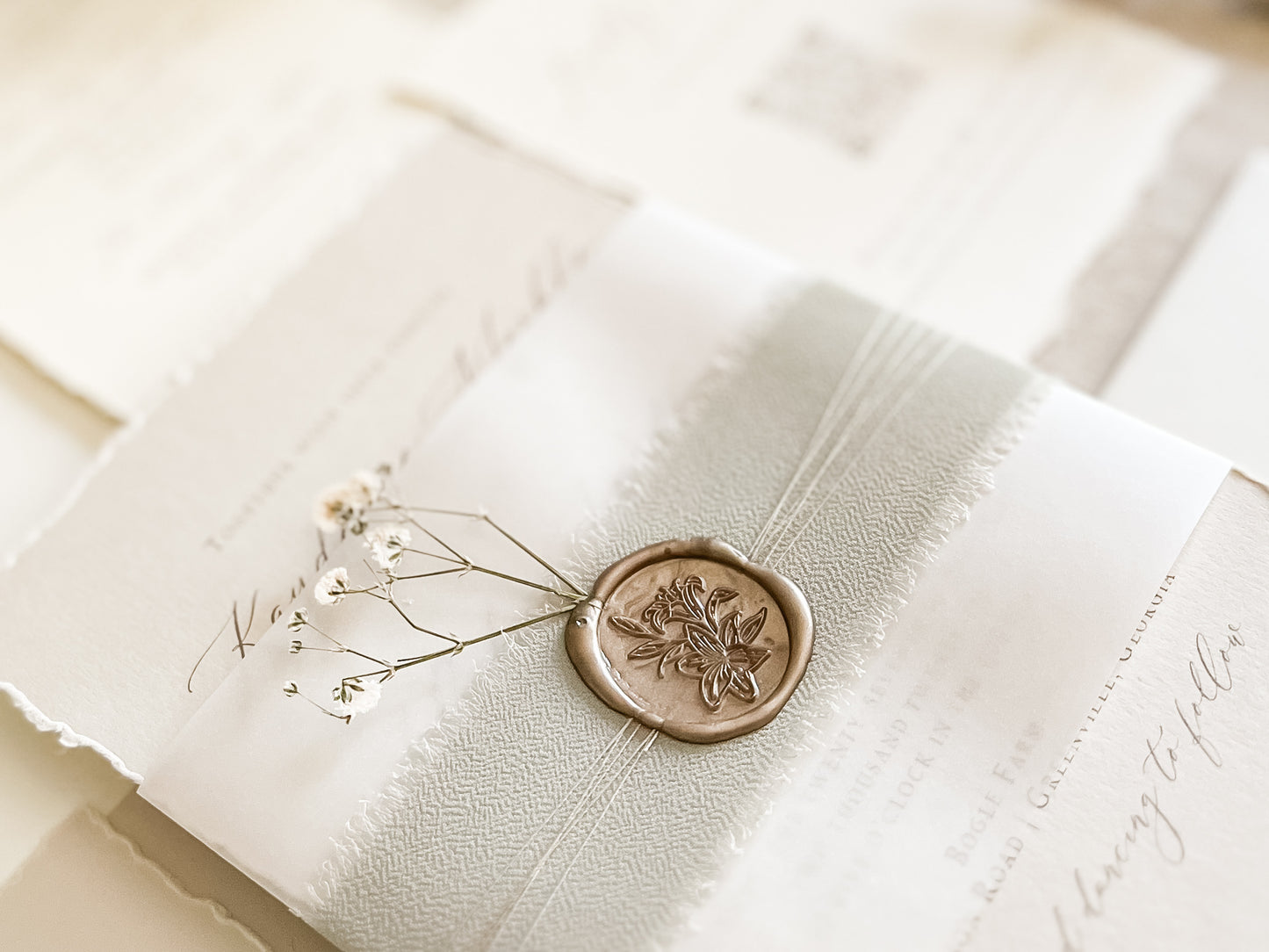 Muted Sage Green Wedding Invitation with Deckled Edging, Vellum, Ribbon, Baby’s Breath and Wax Seal