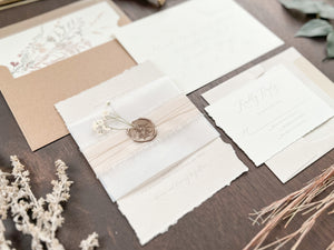 Neutral Wedding Invitation with Deckled Edging, Vellum Belly Band, Chiffon Ribbon, Dried Baby’s Breath and Wax Seal