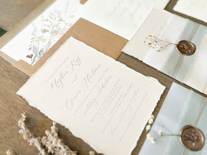 Muted Sage Green Wedding Invitation with Deckled Edging, Vellum Belly Band, Chiffon Ribbon, Dried Baby’s Breath and Wax Seal