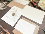 Elegant Ivory Baby’s Breath Wedding Invitation with Deckled Edging, Vellum Belly Band and Wax Seal