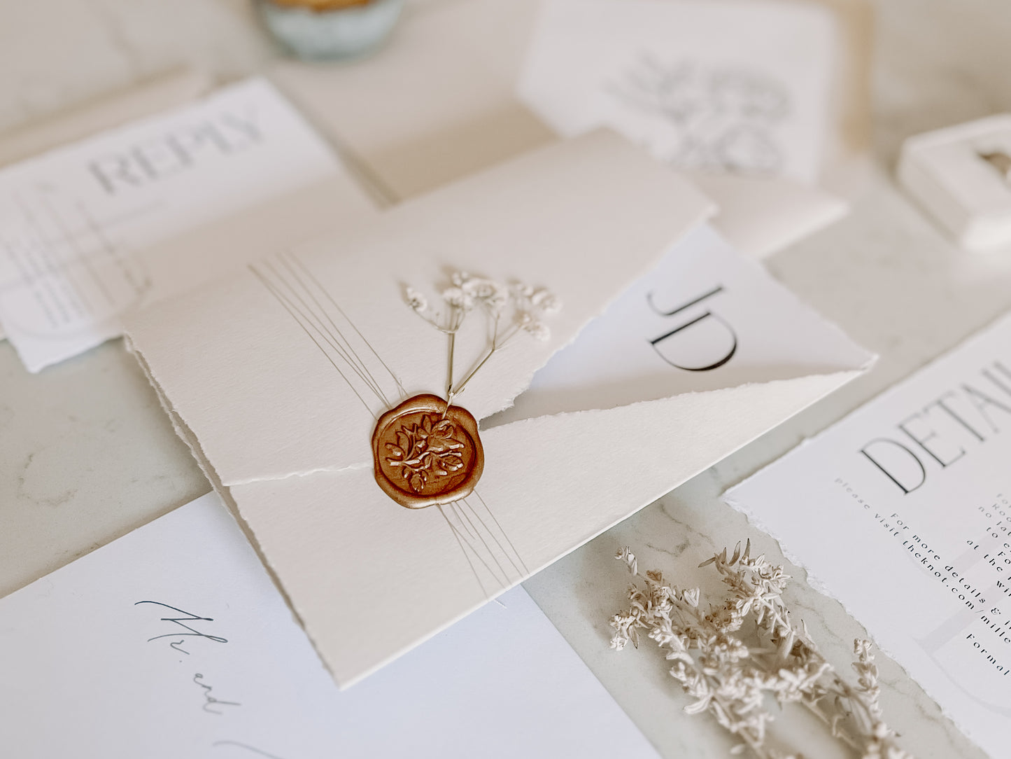 Trifold Monogram Wedding Invitation with Baby’s Breath, Wrap & Wax seal