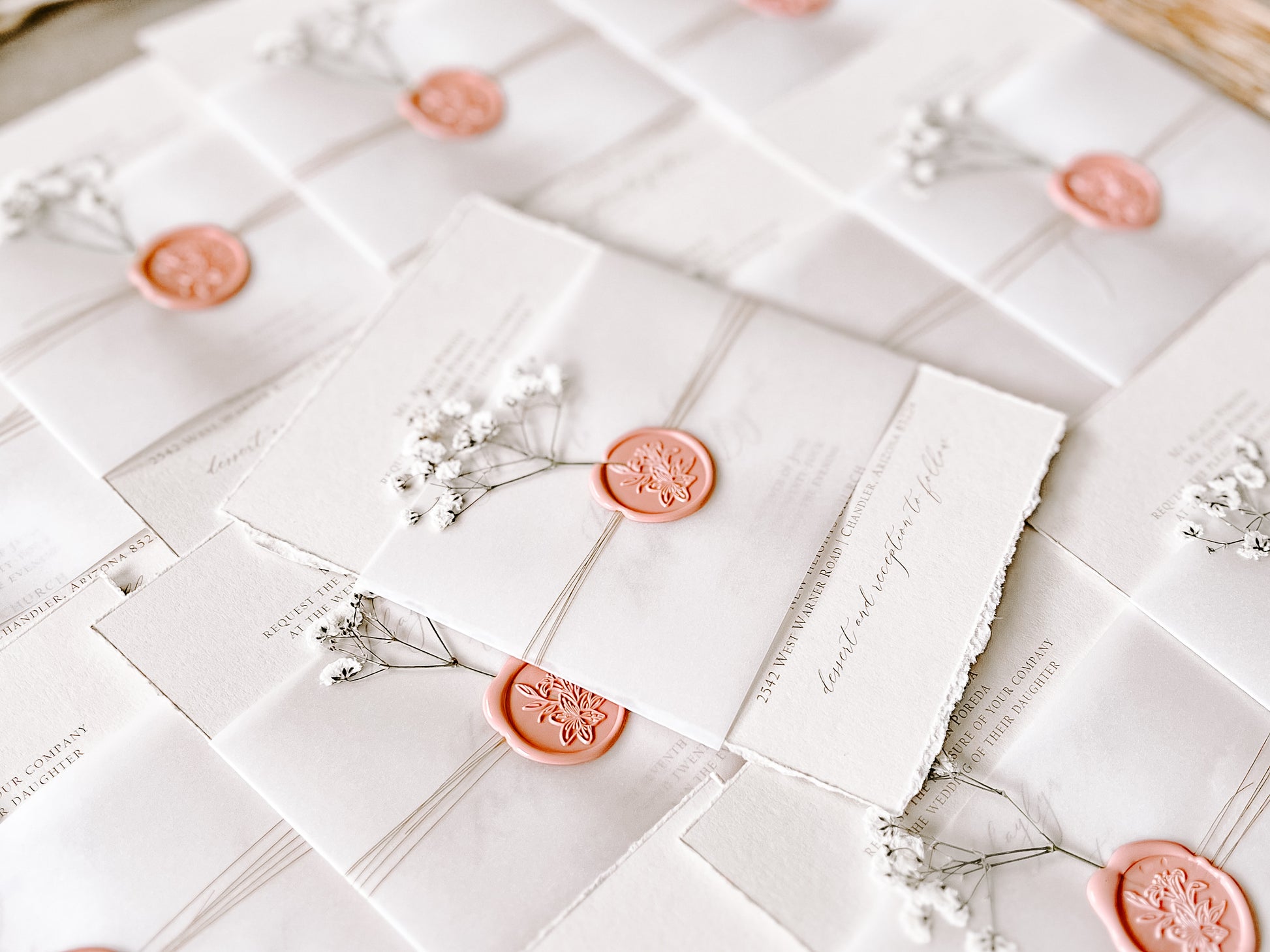 Dusty Rose Pink Wedding Invitation with Baby’s Breath, Deckled Edging, Vellum Belly Band and Wax Seal