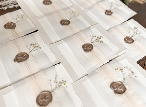Neutral Wedding Invitation with Deckled Edging, Vellum Belly Band, Chiffon Ribbon, Dried Baby’s Breath and Wax Seal