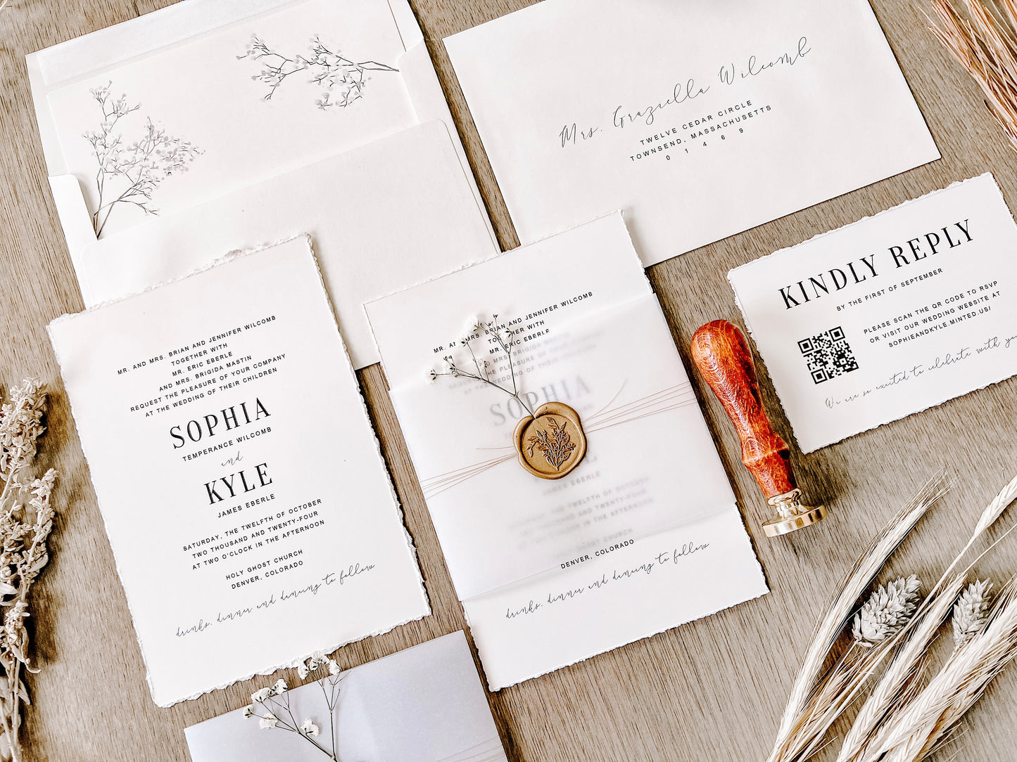 Contemporary Ivory Wedding Invitation with Baby’s Breath, Deckled Edging, Vellum Belly Band and Wax Seal