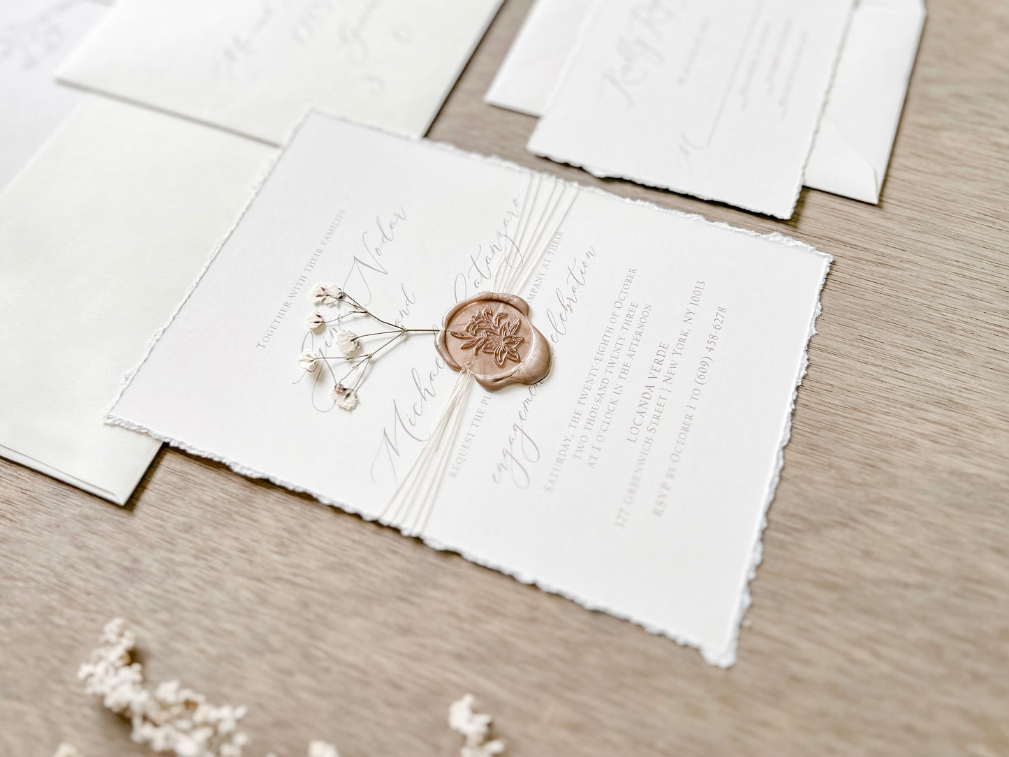 Elegant Ivory Baby’s Breath Wedding Invitation with Deckled Edging and Wax Seal