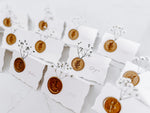 Folding Tent Wedding Place Cards with Baby’s Breath, Wax Seal and Deckled Edging