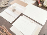 Neutral Wedding Invitation with Deckled Edging, Vellum Belly Band, Chiffon Ribbon, Dried Baby’s Breath and Wax Seal