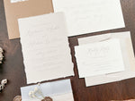 Neutral Wedding Invitation with Deckled Edging, Vellum Belly Band, Chiffon Ribbon, Dried Baby’s Breath and Wax Seal