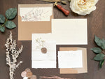 Elegant Ivory Baby’s Breath Wedding Invitation with Deckled Edging, Vellum Belly Band and Wax Seal