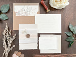 Neutral Wedding Invitation with Deckled Edging, Vellum Belly Band, Chiffon Ribbon, Dried Baby’s Breath and Wax Seal