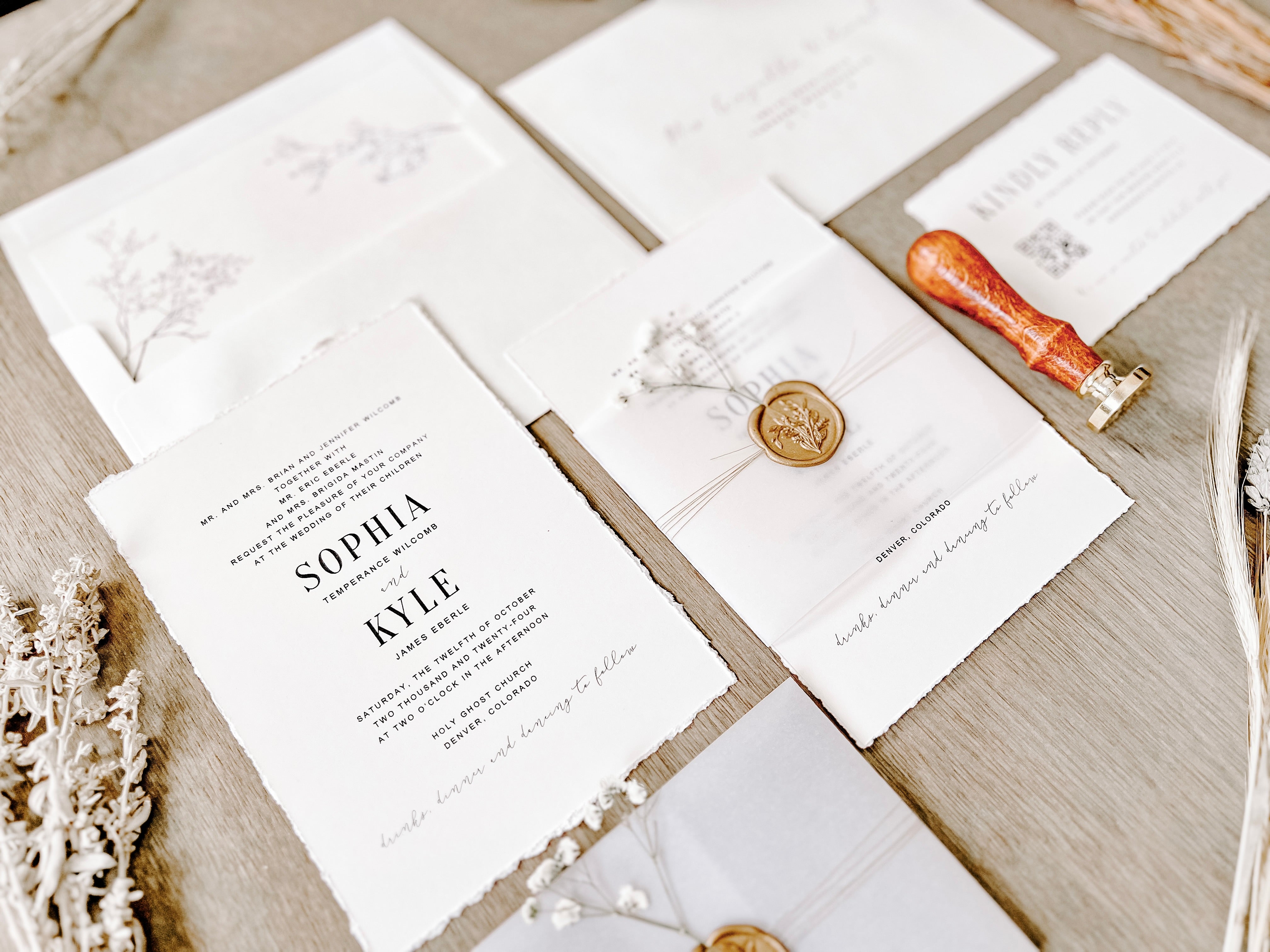 Contemporary Ivory Wedding Invitation with Baby’s Breath, Deckled Edging, Vellum Belly Band and Wax Seal