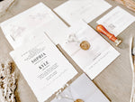 Contemporary Ivory Wedding Invitation with Baby’s Breath, Deckled Edging, Vellum Belly Band and Wax Seal