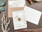 Neutral Wedding Invitation with Deckled Edging, Vellum Belly Band, Chiffon Ribbon, Dried Baby’s Breath and Wax Seal