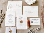 Contemporary Ivory Wedding Invitation with Baby’s Breath, Deckled Edging, Vellum Belly Band and Wax Seal