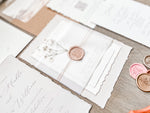 Neutral Wedding Invitation with Baby’s Breath, Deckled Edging, Vellum Belly Band and Wax Seal