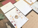 Plum and Yellow Gold Wildflower Vellum Wedding Invitation with Wax Seal