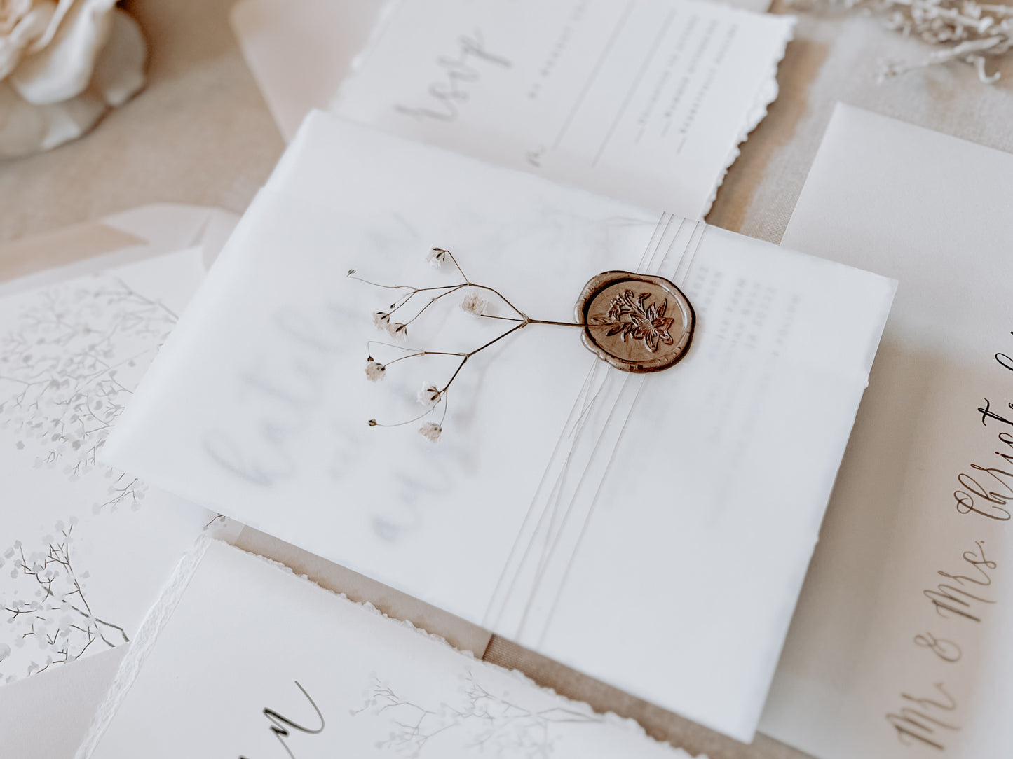 Baby’s Breath Wedding Invitation with Deckled Edging, Vellum Wrap and Wax Seal