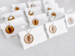 Folding Tent Wedding Place Cards with Baby’s Breath, Wax Seal and Deckled Edging