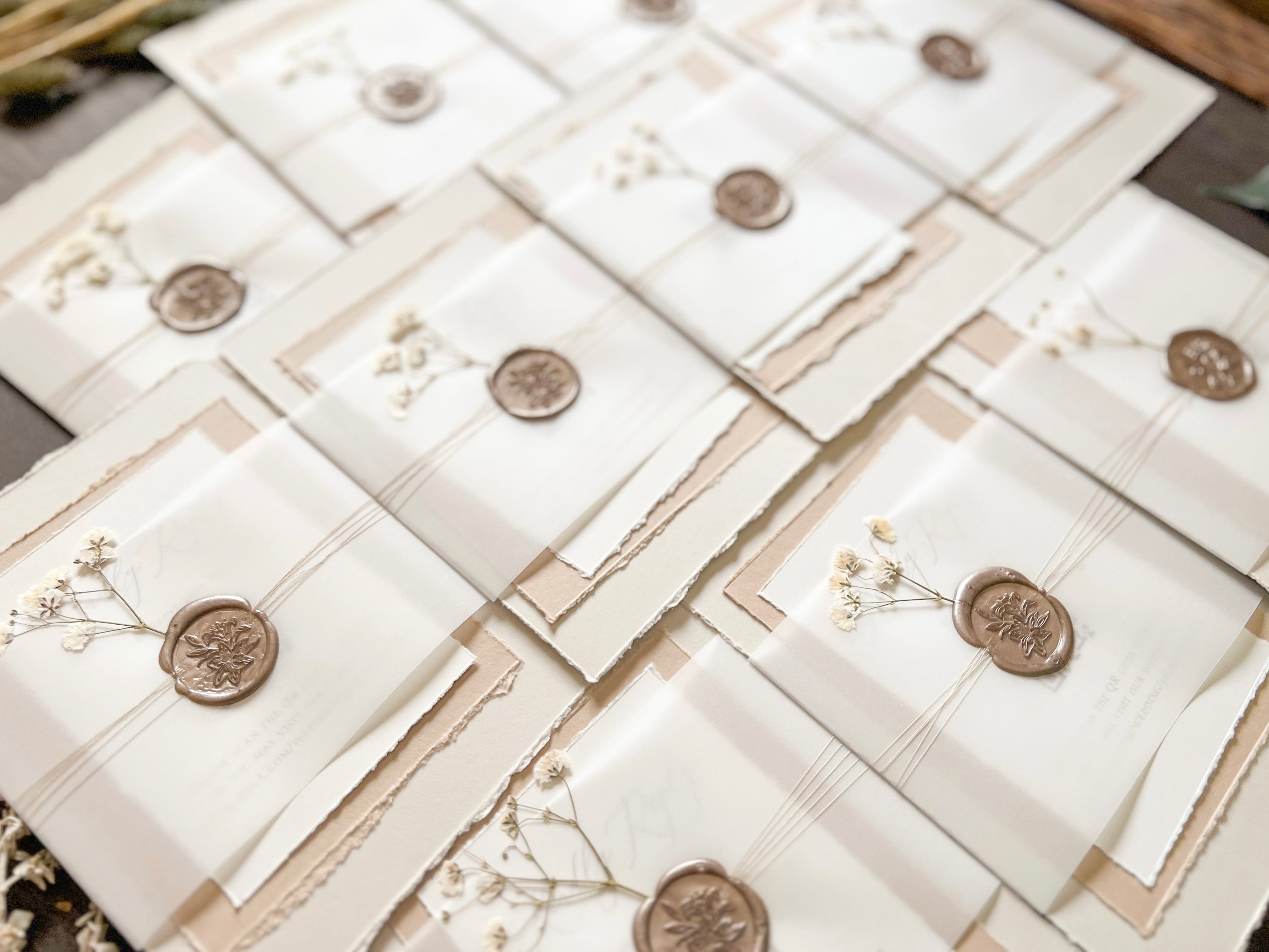 Elegant Beige Baby’s Breath Wedding Invitation with Deckled Edging, Vellum Belly Band and Wax Seal